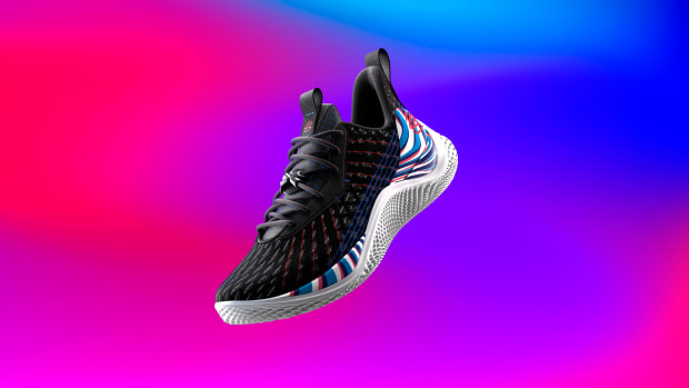 View of black and white Curry shoes.